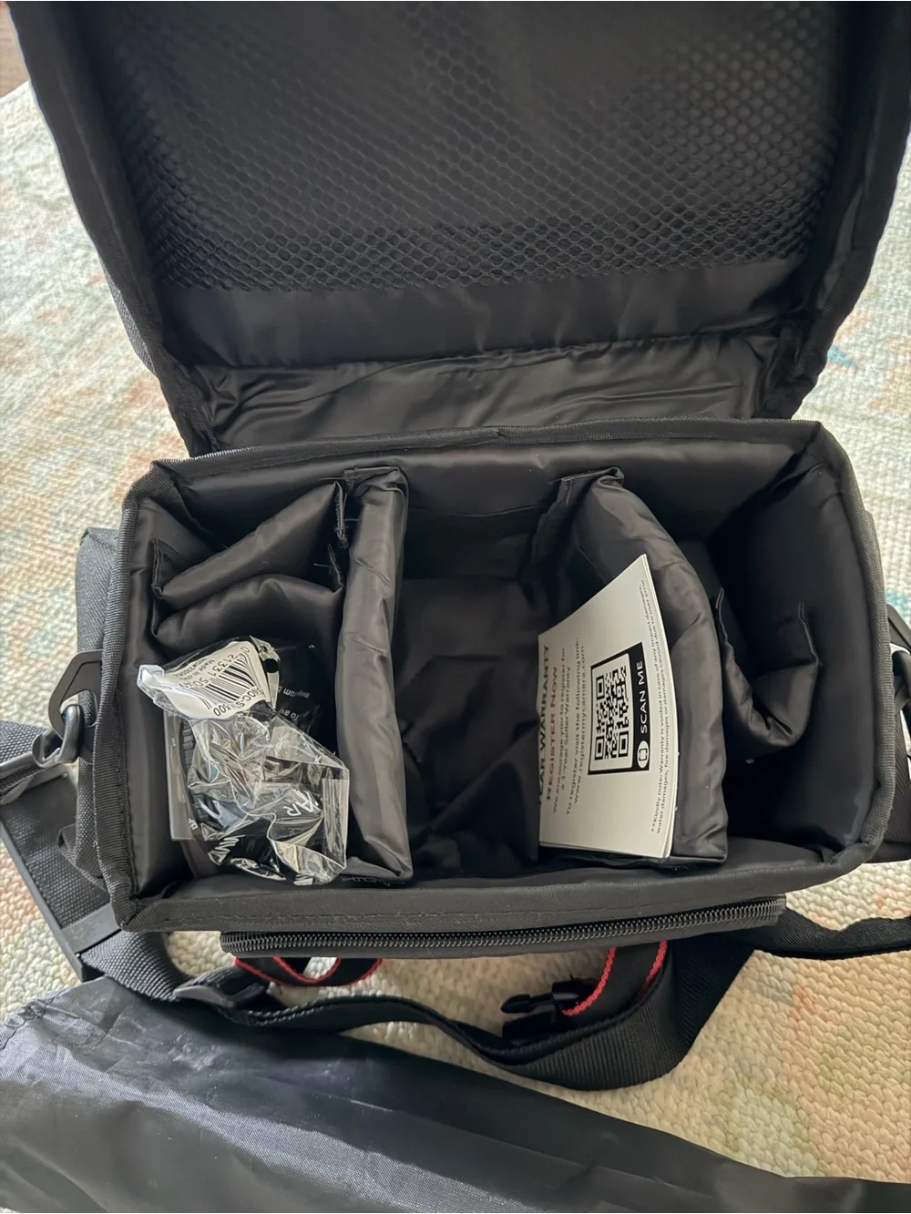 Nikon Black DSLR with 18-55mm Lens and Branded Strap